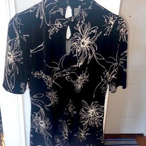 Mallorca black short sleeve knit top, never worn, new with tags! Side medium